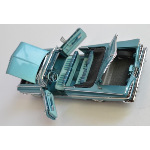 859 - A Danbury Mint 1/24 diecast 1959 Chevrolet Impala Convertible, boxed with COA and roof.