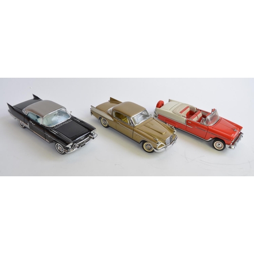 860 - 1 Danbury and 2 Franklin Mint 1/24 diecast car models, all unboxed:
Danbury 1957 Studebaker Golden H... 