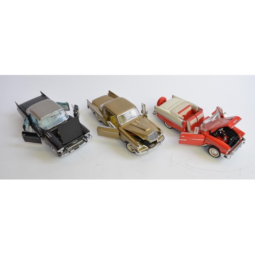 860 - 1 Danbury and 2 Franklin Mint 1/24 diecast car models, all unboxed:
Danbury 1957 Studebaker Golden H... 