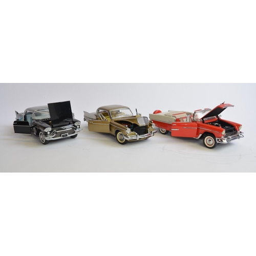 860 - 1 Danbury and 2 Franklin Mint 1/24 diecast car models, all unboxed:
Danbury 1957 Studebaker Golden H... 