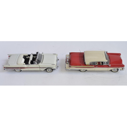 863 - 2 boxed 1/24 diecast car models:
Danbury Mint 1957 Mercury Turnpike Cruiser. Good condition, 2 small... 