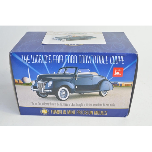 835 - A boxed Franklin Mint 1/24 1939 Ford Deluxe Convertible Coupe, with paperwork, custom nameplate etc.