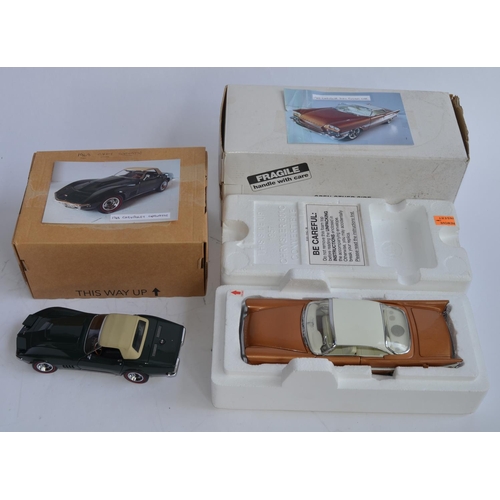 877 - 2 1/24 Danbury Mint diecast car models:
A boxed 1957 Chrysler 300C Custom. Model in excellent extern... 