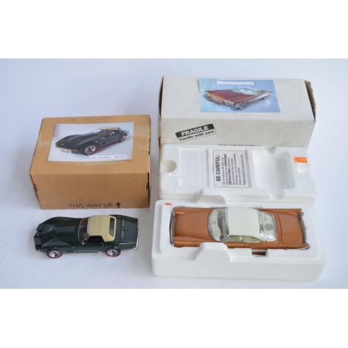 877 - 2 1/24 Danbury Mint diecast car models:
A boxed 1957 Chrysler 300C Custom. Model in excellent extern... 