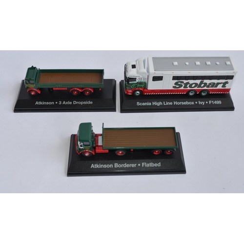 891A - 13 boxed Atlas Editions Eddie Stobart models.