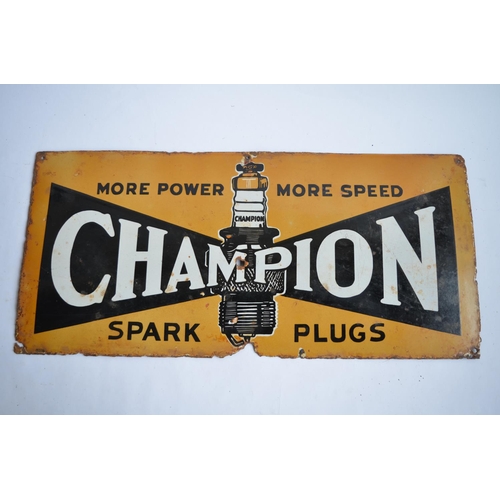 949 - A Champion Spark Plugs enamelled steel advertising sign.
L76.5xH35.7cm