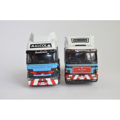 914 - 2 1/50 W.H.Malcolm limited edition truck models by Corgi:
No 75806, 398/2900 M.A.N. Curtainside. 
CC... 