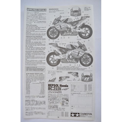 930 - A Tamiya 1/12 Repsol Honda RC211V model kit, complete and unstarted, all bags still factory sealed, ... 