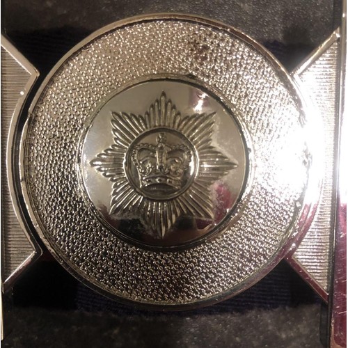 141c - Stable belt with Crown and Star motif and a Royal Core of Transport cap badge and a zippo lighter fr... 