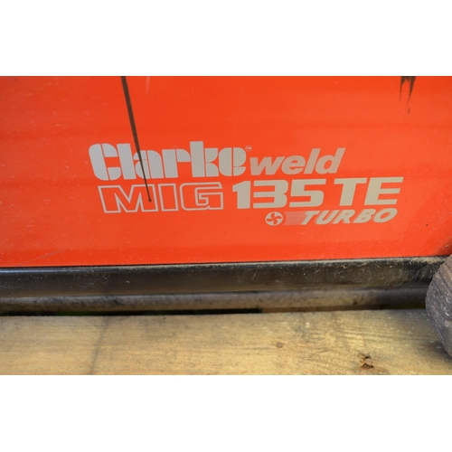 1233 - A Clarke 135TE Turbo Mig Welder with handheld mask