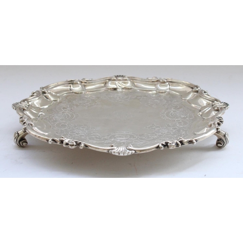 641 - William IV hallmarked silver salver with shell and scroll border, body later engraved in a rose and ... 