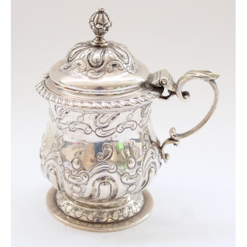 646 - Victorian pair of hallmarked silver condiment pots with scrolled handles, hinged lids and baluster f... 