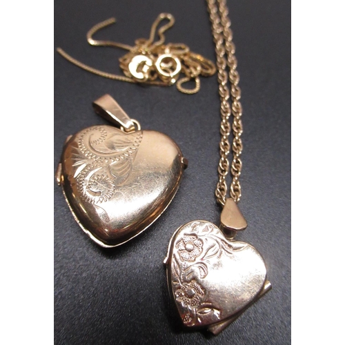 22 - 9ct yellow gold heart shaped locket pendant, stamped 375, another 9ct gold heart locket, stamped 375... 