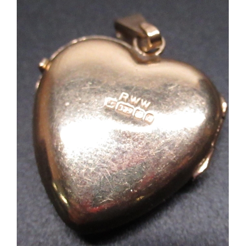 22 - 9ct yellow gold heart shaped locket pendant, stamped 375, another 9ct gold heart locket, stamped 375... 