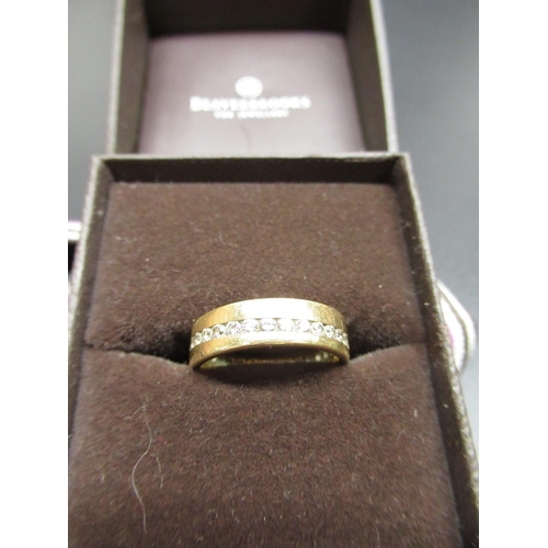 29 - 18ct yellow gold wedding band set with diamonds, stamped 750, size M, 5.8g