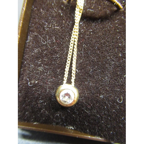 32 - 18ct yellow gold diamond solitaire pendant necklace, the brilliant cut diamond inset in 18ct gold mo... 