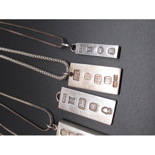 51 - Six hallmarked Sterling silver ingot pendants, five on chains stamped 925, gross 3.58ozt