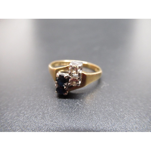 47 - 18ct yellow gold diamond and sapphire ring, the two brilliant cut diamonds and sapphires set in rect... 
