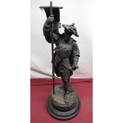 1149 - Patinated spelter model of a Soldier, titled F Cortez, on turned wooden base, H62cm