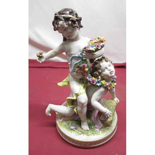 1152 - Capo-di Monte style Volkstedt porcelain model of two cherub flower pickers, on circular base, H35cm