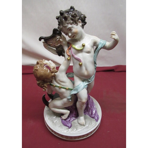 1153 - Capo-di Monte style Volkstedt porcelain model of two cherubs emblematic of the Arts, on circular bas... 