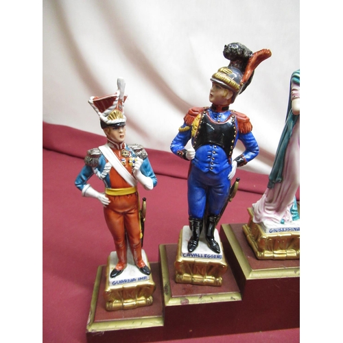 1154 - Set of six Naples Continental porcelain models of Napoleonic Soldiers, on stepped plinth, and anothe... 