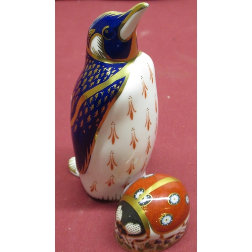 1167 - Royal Crown Derby model of a Penguin, code XLV111, (2nd quality) and a RCD Ladybird paperweight with... 