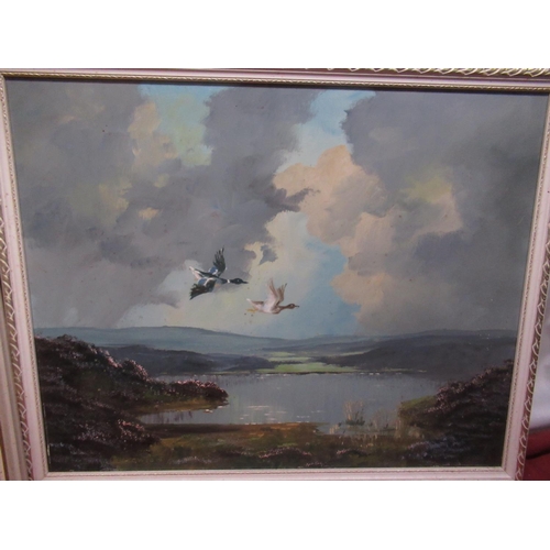 500 - Lewis Creighton (British, 1918-1996); Ducks flying over moorland, oil on canvas, and another moorlan... 