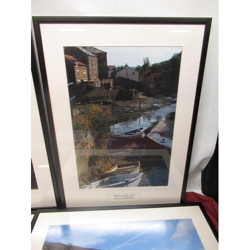 503 - After Dave Manship (British, contemporary); set of five framed and mounted photographs of Staithes, ... 