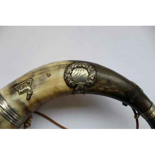 310 - Large hunting horn made from cows horn with metal trumpet and mouthpiece, with two badges