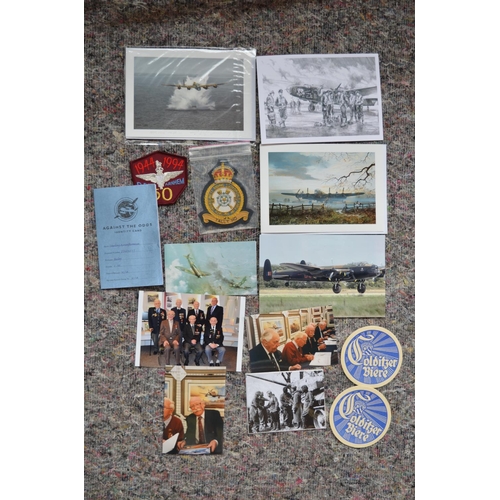 261 - A mixed collection of military memorabilia concerning World War II. Includes veteran signed pamphlet... 