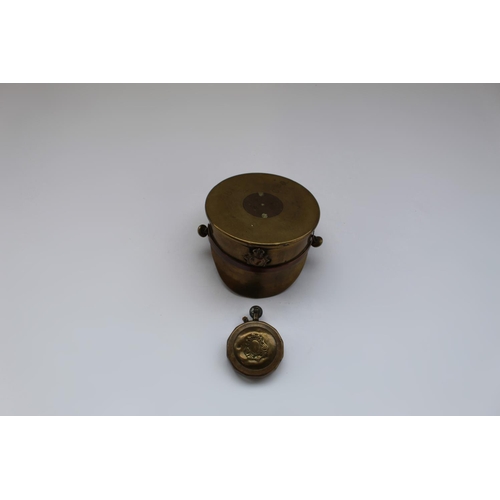 307 - WWI trench art shell case in the form of a soldiers peaked cap, trench art lighter made from large b... 