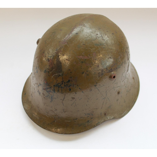 382 - German Military Stahlhelm type helmet, green painted with ridgeback