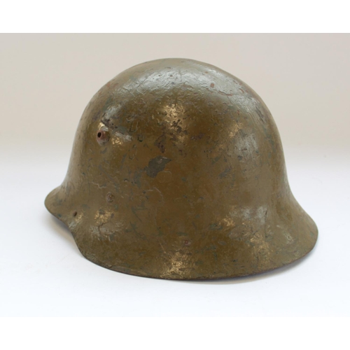 382 - German Military Stahlhelm type helmet, green painted with ridgeback