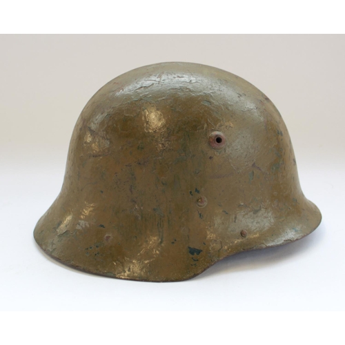 382 - German Military Stahlhelm type helmet, green painted with ridgeback