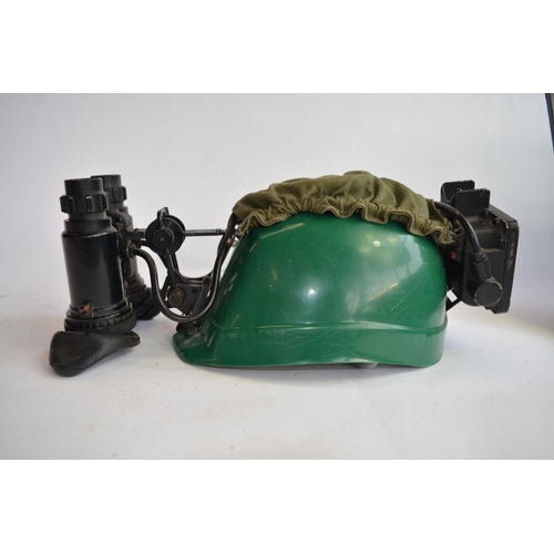 282 - A set of night vision goggles with battery pack attached to a plastic miners hat. Takes 1 