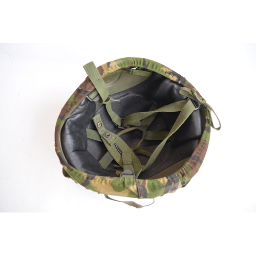 283 - A British Army combat helmet Mk6 and a pair of British Army Northern Ireland black leather patrol gl... 