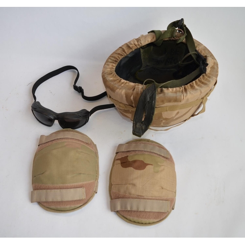 284 - A collection of British Army desert clothing including a MK6 helmet with dark goggles and spare helm... 