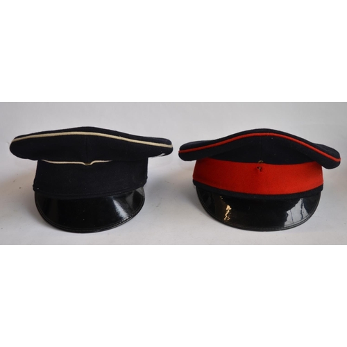 289 - 4 British Army caps, 3 Royal Artillery (2 with cap badges) and another cap with no badge.