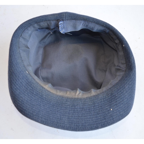 461 - An RAF female officers cap (no size/markings) and a US Police cap by Tabuchi's of Stockton Californi... 