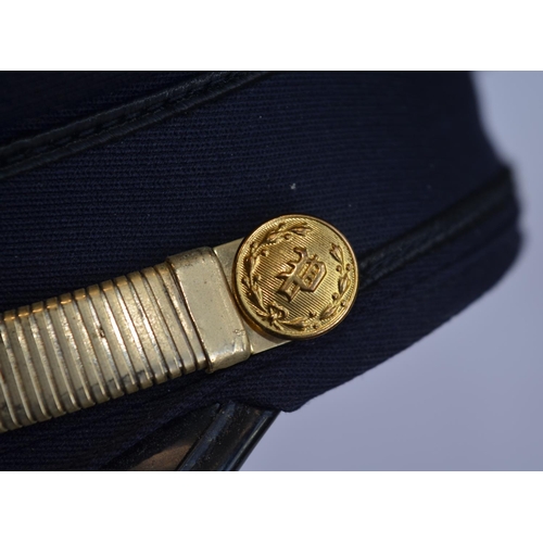 461 - An RAF female officers cap (no size/markings) and a US Police cap by Tabuchi's of Stockton Californi... 