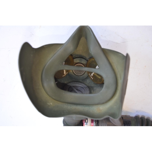 465 - 3 vintage oxygen masks from the 1950s. An R A Hawks/MSA RAF issue Type A-13 mask with hose, end conn... 