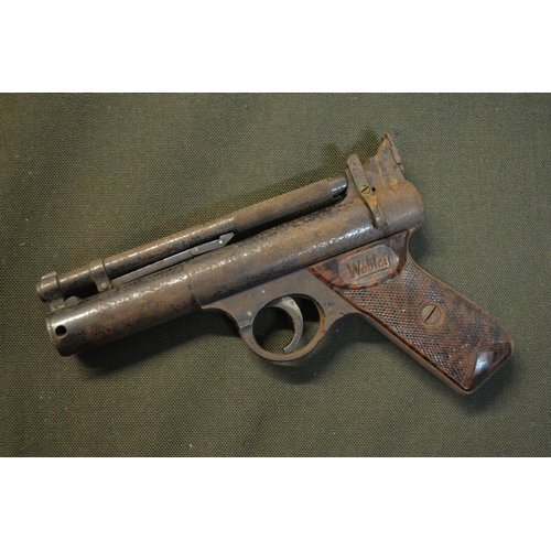 797 - A vintage Webley Senior .22 over lever action air pistol in working order. Heavy surface corrosion.