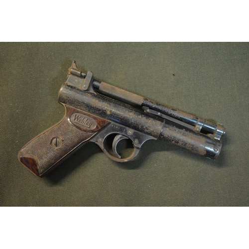 797 - A vintage Webley Senior .22 over lever action air pistol in working order. Heavy surface corrosion.