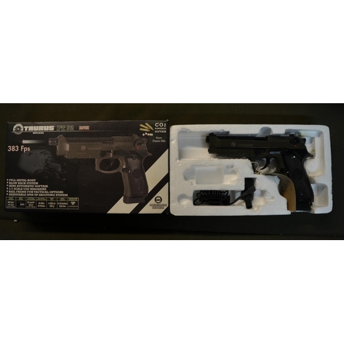 807 - A boxed Taurus PT 92 fully metal CO2 powered 6mm BB pistol, with blow back system, semi-automatic.