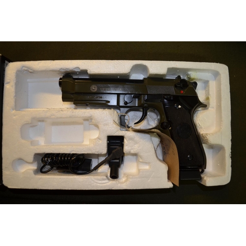 807 - A boxed Taurus PT 92 fully metal CO2 powered 6mm BB pistol, with blow back system, semi-automatic.