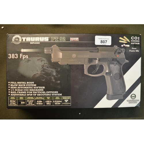 807 - A boxed Taurus PT 92 fully metal CO2 powered 6mm BB pistol, with blow back system, semi-automatic.