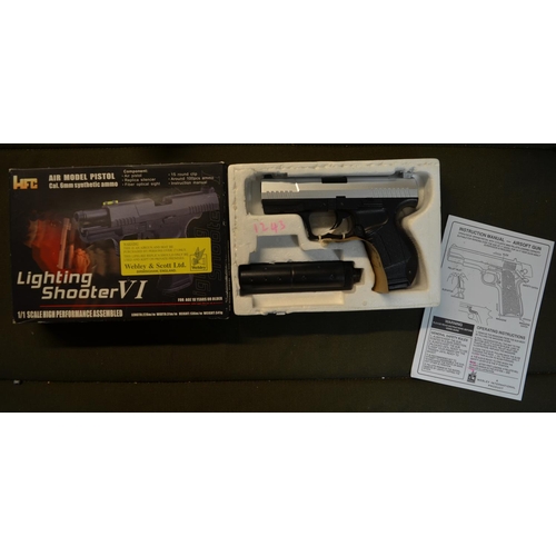 809 - An HFC Lighting Shooter VI 6mm pull back action spring operated pellet gun.