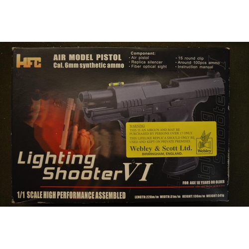 809 - An HFC Lighting Shooter VI 6mm pull back action spring operated pellet gun.