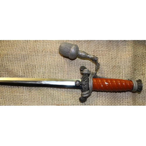 537 - German Third Reich style officer's dagger, blade stamped WKC Solingen, complete with dress knot and ... 